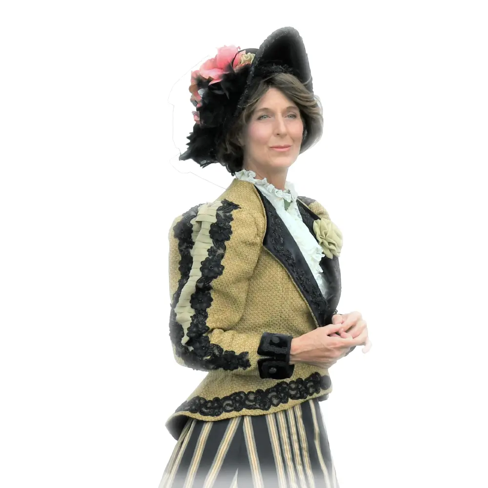 A woman in costume standing next to a wall.