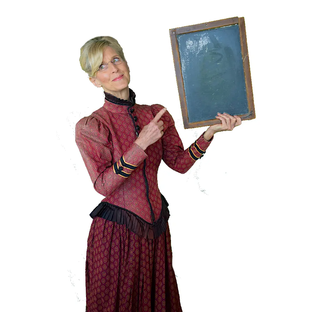 A woman holding an empty chalkboard in her hand.
