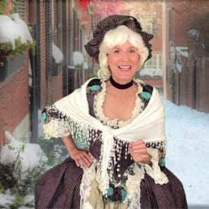A joyful elderly woman dressed in vintage attire with a lace shawl.